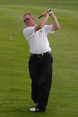 Image showing Male golfer playing golf