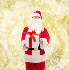 Image showing man in costume of santa claus with gift box