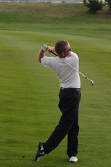 Image showing Male golfer playing golf