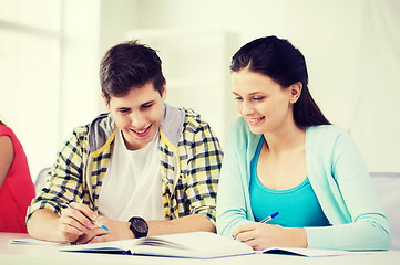 Image showing students with textbooks and books at school