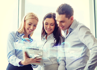 Image showing business team working with tablet pc in office