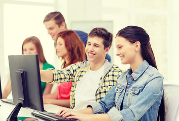 Image showing female student with classmates in computer class