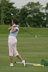 Image showing Female golfer playing golf