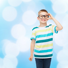 Image showing smiling little boy in eyeglasses