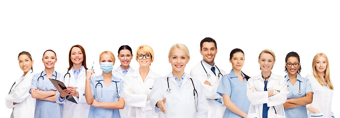 Image showing smiling female doctors and nurses with stethoscope