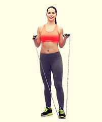 Image showing sporty woman with with skipping rope