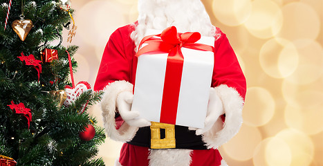 Image showing man in costume of santa claus with gift box