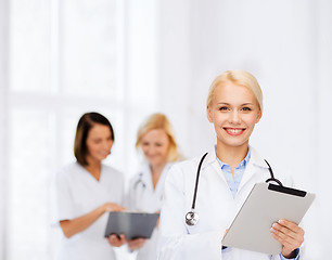 Image showing female doctor with stethoscope and tablet pc