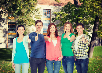 Image showing group of smiling students showing thumbs up