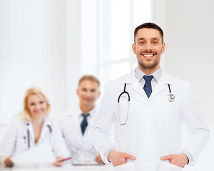 Image showing smiling male doctor with stethoscope