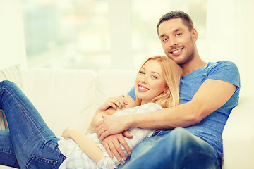 Image showing smiling happy couple at home