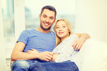 Image showing smiling happy couple at home