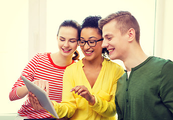 Image showing smiling students with tablet pc at school