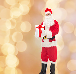 Image showing man in costume of santa claus with gift box