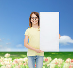 Image showing little girl wearing eyeglasses with blank board