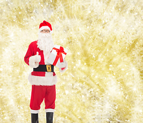 Image showing man in costume of santa claus with gift box