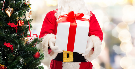 Image showing man in costume of santa claus with gift box