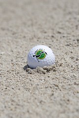 Image showing Golf ball in sand trap