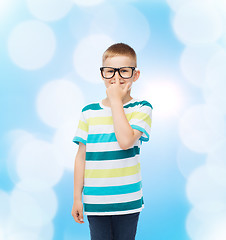 Image showing smiling little boy in eyeglasses