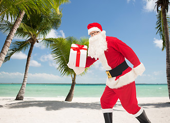 Image showing man in costume of santa claus with gift box