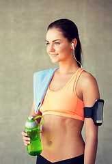 Image showing woman with bottle of water in gym