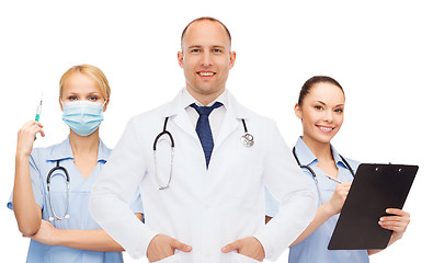 Image showing group of smiling doctors with clipboard