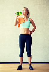 Image showing woman with bottle of water in gym