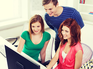 Image showing group of smiling students having discussion