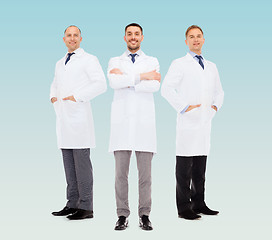 Image showing smiling male doctors in white coats