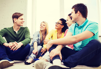 Image showing five smiling teenagers having fun at home