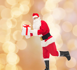 Image showing man in costume of santa claus with gift box