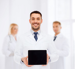 Image showing smiling male doctor with tablet pc