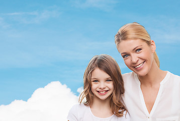 Image showing smiling mother and little girl