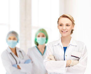 Image showing smiling young female doctor in hospital