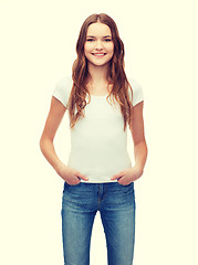 Image showing smiling teenager in blank white t-shirt