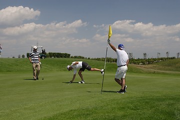 Image showing Golfers in golf course
