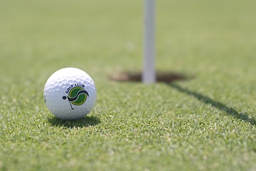 Image showing Golf ball on golf green