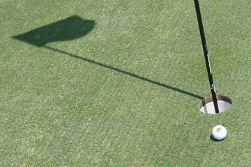 Image showing Golf ball on golf green