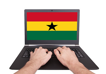 Image showing Hands working on laptop, Ghana