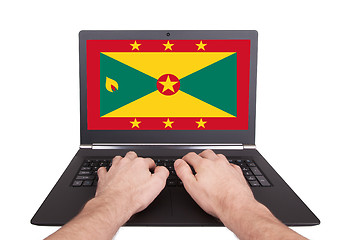 Image showing Hands working on laptop, Grenada