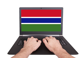 Image showing Hands working on laptop, Gambia