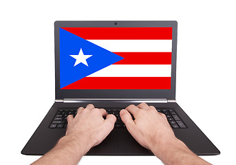 Image showing Hands working on laptop, Puerto Rico