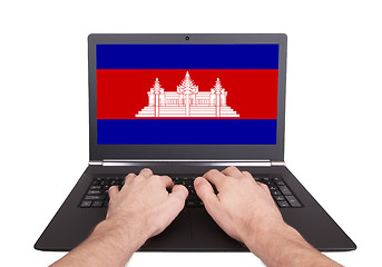 Image showing Hands working on laptop, Cambodia
