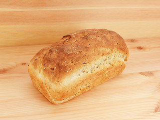 Image showing Freshly baked loaf of oat and linseed bread