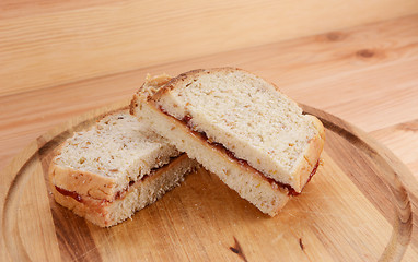 Image showing Two homemade peanut butter and jam sandwiches 