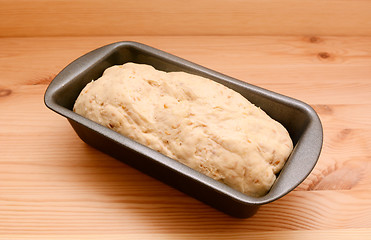 Image showing Raw bread dough in a 2 lb loaf tin