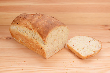 Image showing Cut slice from a freshly baked loaf of bread