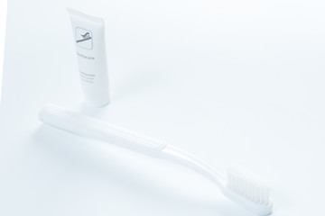 Image showing Toothpaste and toothbrush over white