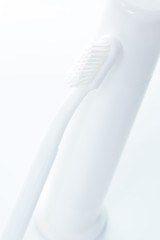 Image showing Toothpaste and toothbrush over white