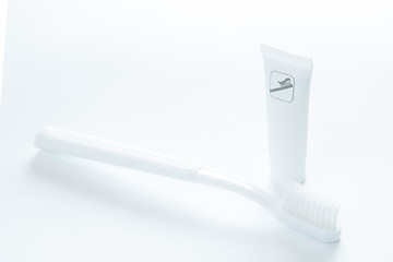 Image showing Toothpaste and toothbrush over white